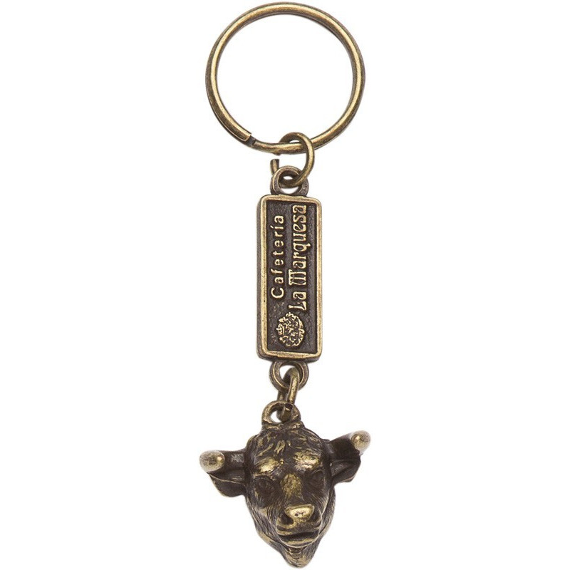 Llavero metálico con motivos Cerdo con calabrote acabado en oro viejo.